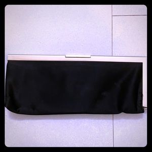 Calvin Klein Black silk clutch with metal frame